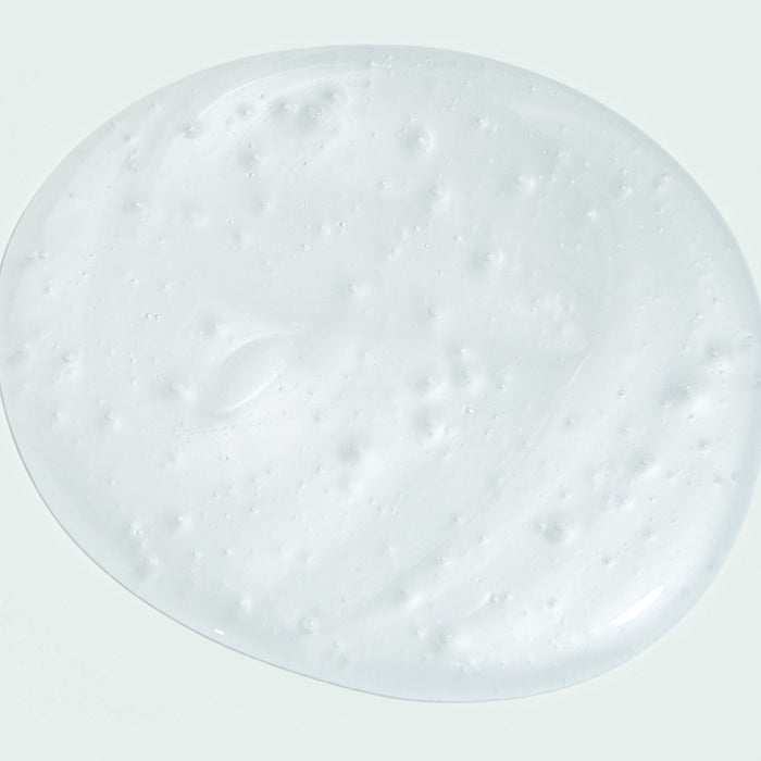 Close-up of a smooth, creamy white gel texture sample representing AGLESS total facial cleanser | IMAGE Skincare for effective skincare and gentle cleansing.
