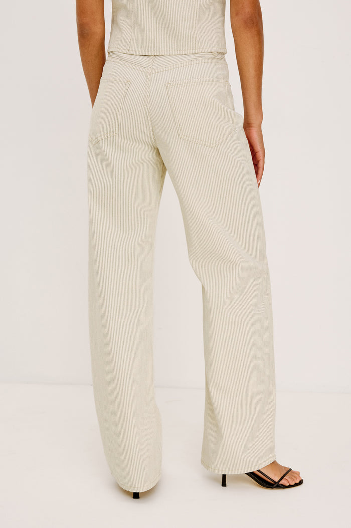 Belmont Arc Leg Jean in Rigid Denim With High-Waisted Fit, Button Fly, and 32" Inseam in Ecru Railroad Stripe Colorway - Lower Body Back View Featured on Model