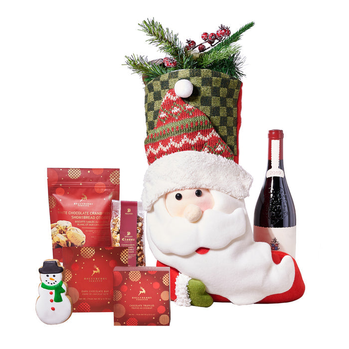 Premium Holiday Wine and Gourmet Snack Gift Basket in Santa-themed Stocking – gift basket with bottle of wine, hollyberry dark chocolate envelope bar