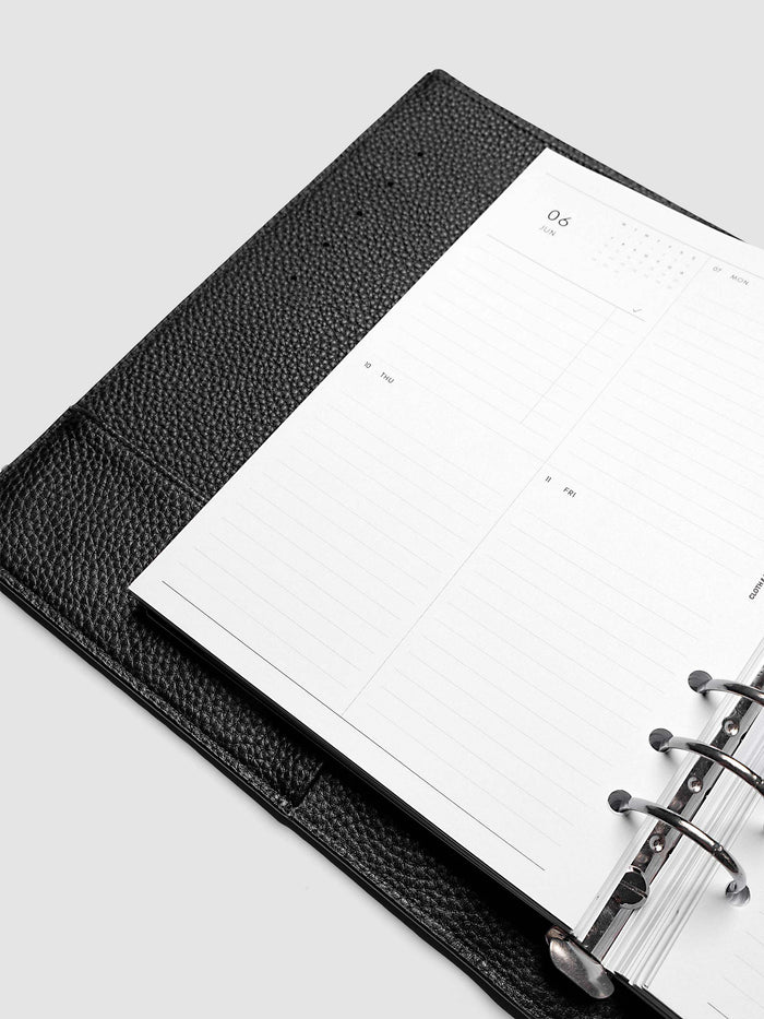 2027 Dated Weekly Vertical Planner Inserts, Monday Start, A5 6-Ring Punch, close-up of the bottom of the left page showing the lower daily grid sections with lined areas for notes and appointments