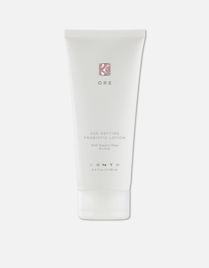 Tube of Age Defying Probiotic Lotion | Zents featuring organic shea and lotus, designed for skincare and body care to support wellness and rejuvenation.