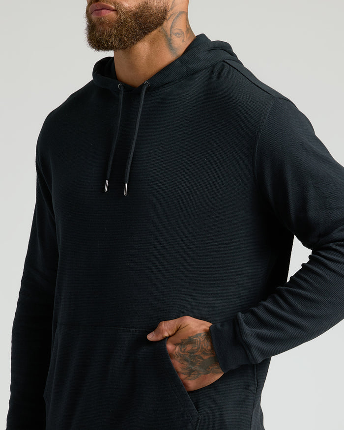 Male model wearing Black & Military Green Waffle Hoodie 2-Pack.