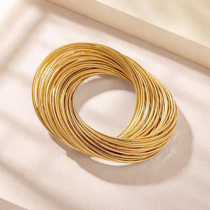 B990 - Layered Hollow Golden Bracelet