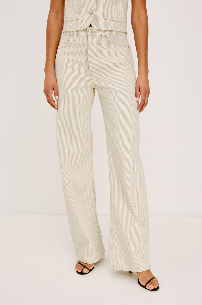 Belmont Arc Leg Jean in Rigid Denim With High-Waisted Fit, Button Fly, and 32" Inseam in Ecru Railroad Stripe Colorway - Lower Body Front View Featured on Model