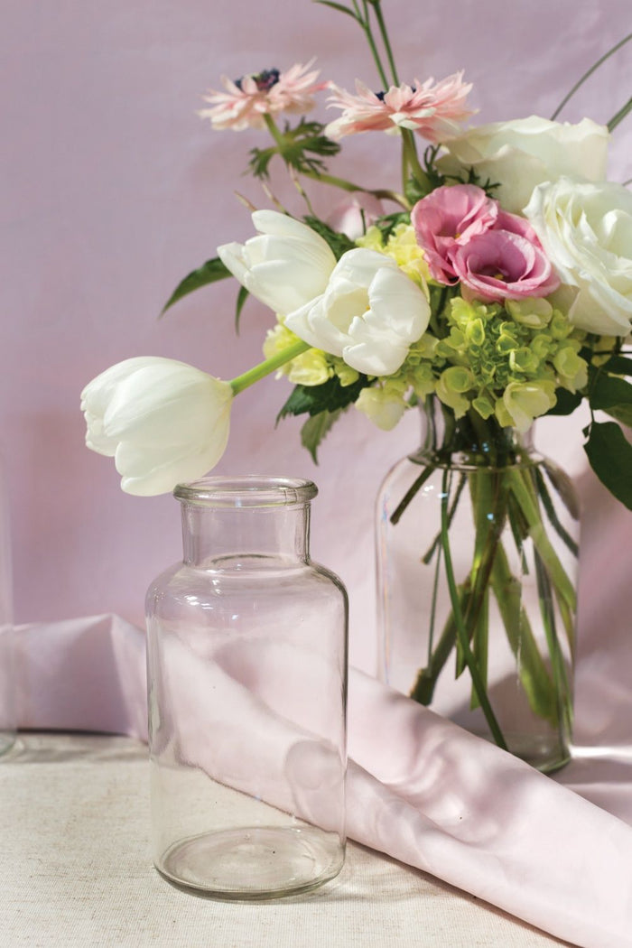 small clear glass bottle vase