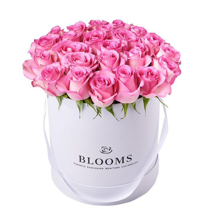 Classic Pink Rose Floral Arrangement with Hat Box Presentation – gift basket with this gorgeous floral gift features a selection of and this floral