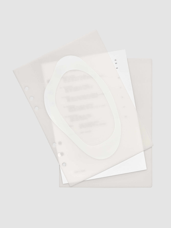 Continuation Planner Cover + Dashboard Set in A5 6-Ring Punch. Milky white frosted plastic cover with a spot gloss organic shape over a black-printed paper dashboard. Image 2 of 5.
