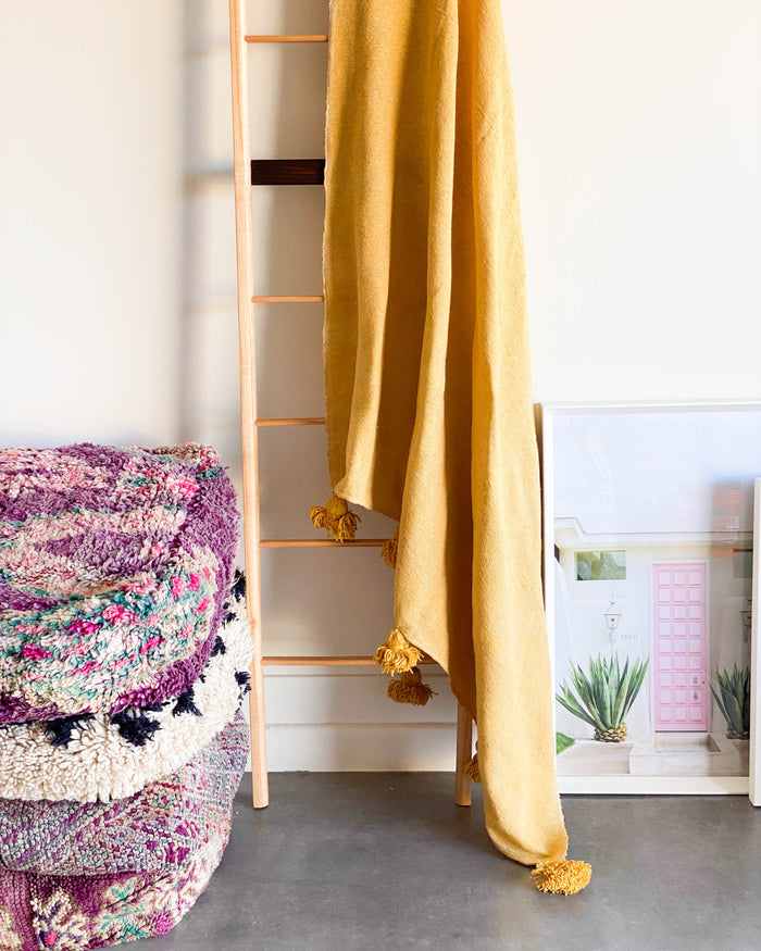 Curry Yellow handwoven Moroccan pom pom blanket