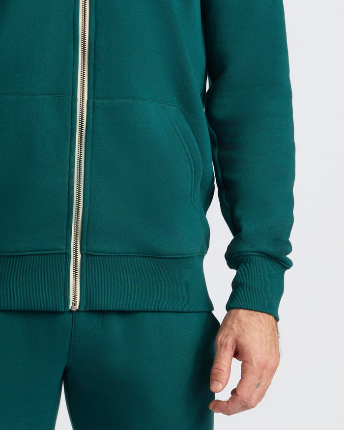 Deep Emerald Fleece French Terry Zip Hoodie with kangaroo pocket and ribbed cuffs.