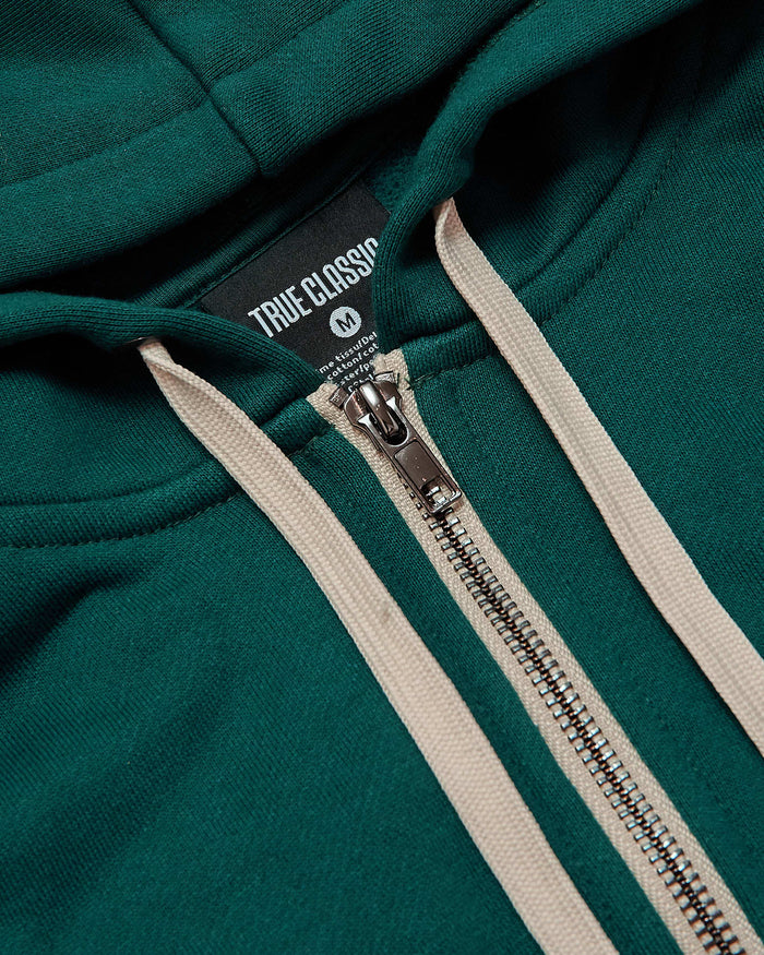 Deep Emerald Fleece French Terry Zip Hoodie with cream draw-cords and metal zipper.