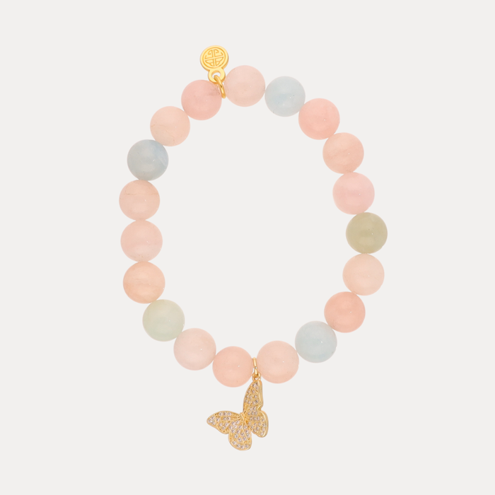 a bracelet with a butterfly charm