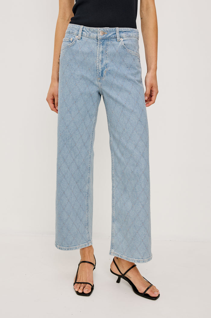 Getty Wide Leg Crop Jean in Light Stretch Denim With Wide Straight Legs, 27″ Inseam, 5-Pockets, and Front Button Fly in Quilted Stud Colorway - Lower Body Front View Featured on Model