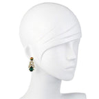Elegant teardrop earrings featuring a dazzling green crystal and clear stones.