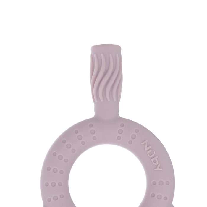 The Nuby Hollow Sensory Tube Teether in Pink/Plum is a silicone baby teether with a circular handle and textured, brush-like top for soothing relief. "Nuby" is embossed on the side of the ring.