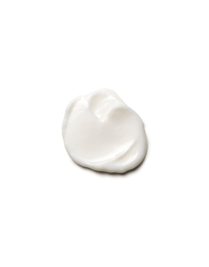 A smooth dollop of creamy white conditioner representing Hydrating Conditioner | Moroccanoil with a rich texture on a clean white background.