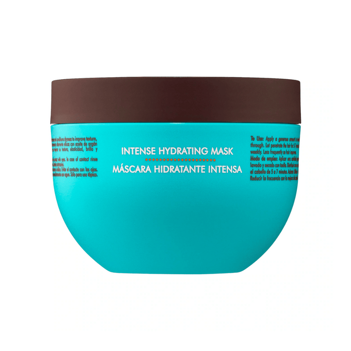 Blue and brown container of Intense Hydrating Mask | Moroccanoil skincare product with English and Spanish text on label, designed for deep hydration and hair care.