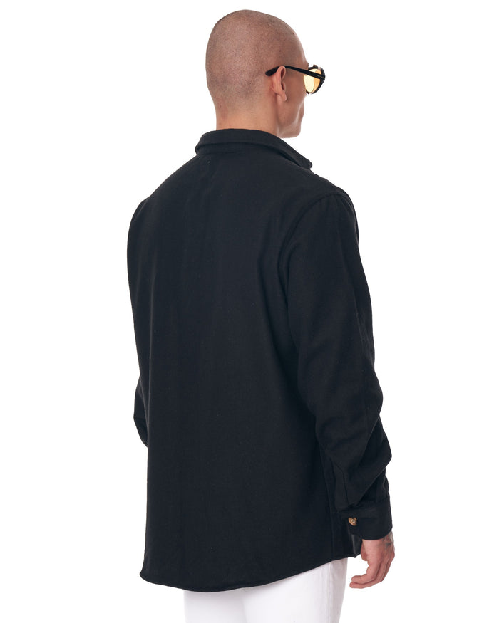 Martin Valen men's black lumberjack shirt three-quarter view, side angle showing long sleeve and cuff button