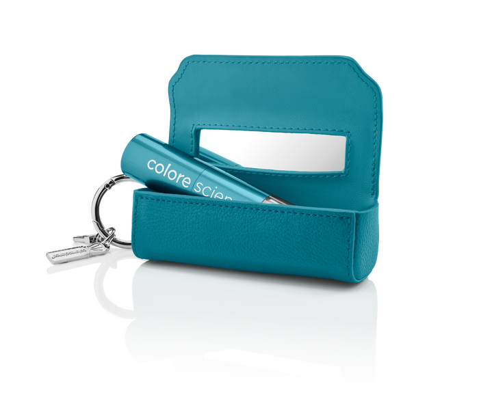 Brush holder open with sunscreen brush inside || all