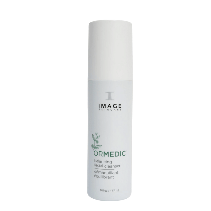 Bottle of ORMEDIC® balancing facial cleanser | IMAGE Skincare with white and green design for gentle skincare and facial cleansing.