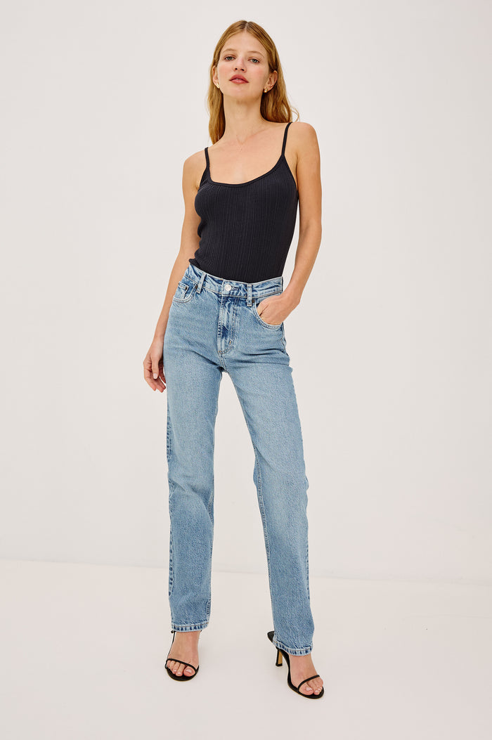 Topanga Petite High-Rise Wide Straight Leg Jean in With 5-Pockets and a Front Zip-Fly in Old Indigo Colorway - Lower Body Front View Featured on Model