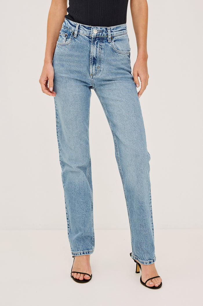 Topanga Petite High-Rise Wide Straight Leg Jean in With 5-Pockets and a Front Zip-Fly in Old Indigo Colorway - Front View Featured on Model