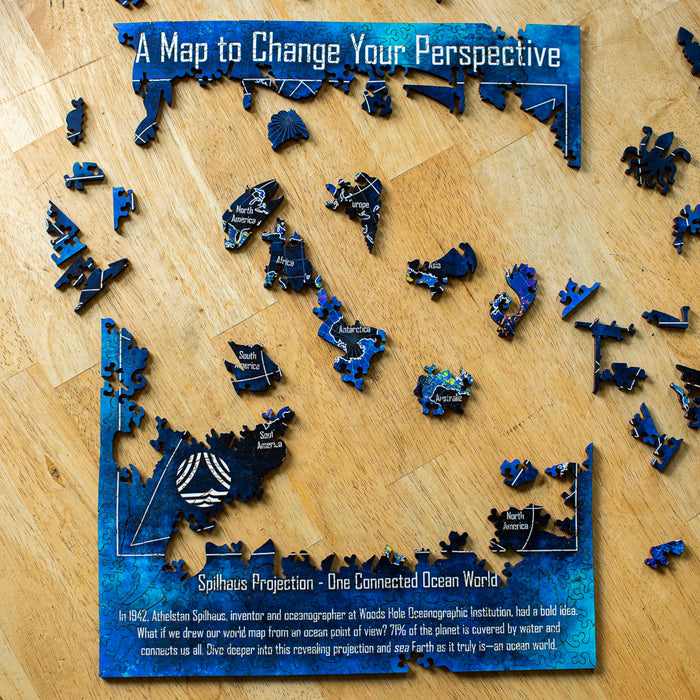 A photograph of the puzzle being put together on a wooden surface.