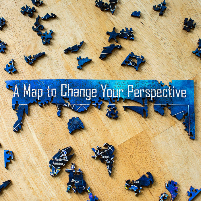A close up of the puzzle being put together featuring the title, "A Map to Change Your Perspective" at the top.