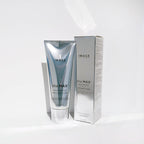 Silver tube and matching box packaging of the MAX™ facial cleanser | IMAGE Skincare displayed on a white surface, highlighting modern skincare product design.