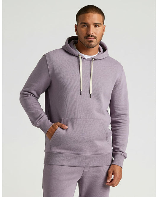 Model in Thistle Fleece French Terry Pullover Hoodie, showcasing relaxed fit.