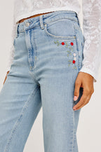 Topanga High-Rise Wide Straight Leg Jean in With 5-Pockets and a Front Zip-Fly in Dainty Rose Colorway - Lower Body Side Close Up View Featured on Model