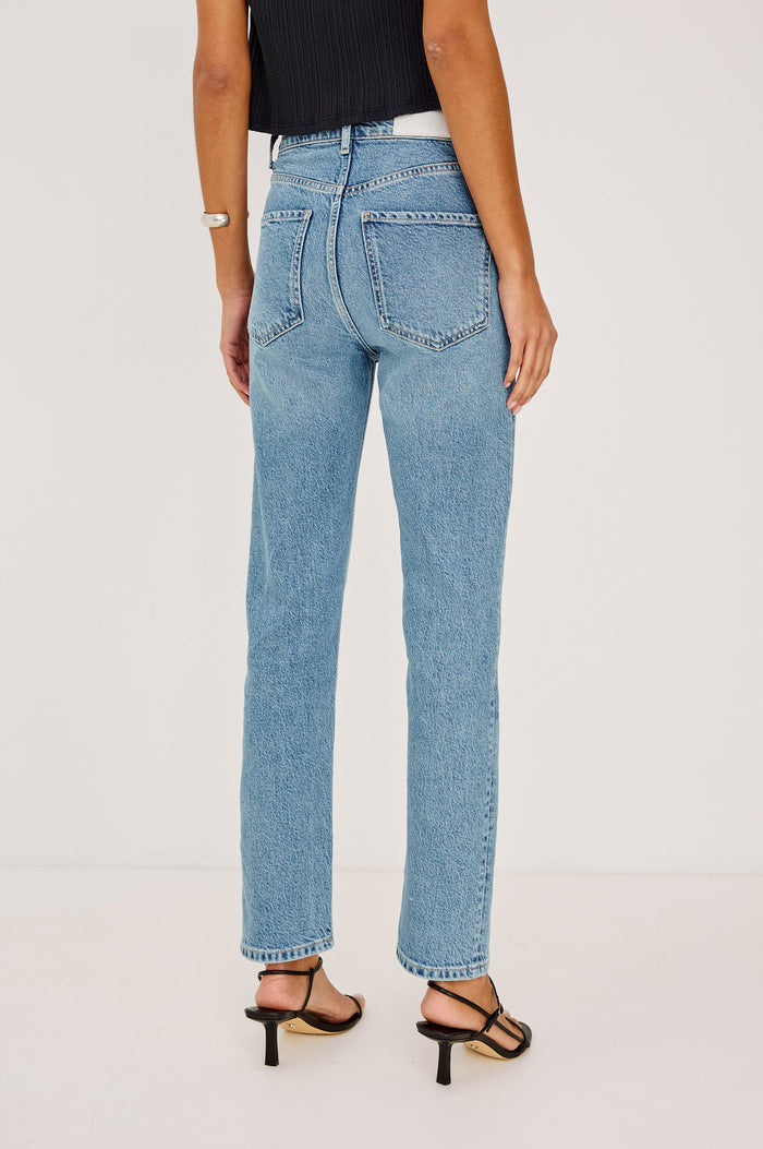 Topanga High-Rise Wide Straight Leg Jean in With 5-Pockets and a Front Zip-Fly in Old Indigo Colorway - Lower Body Back View Featured on Model