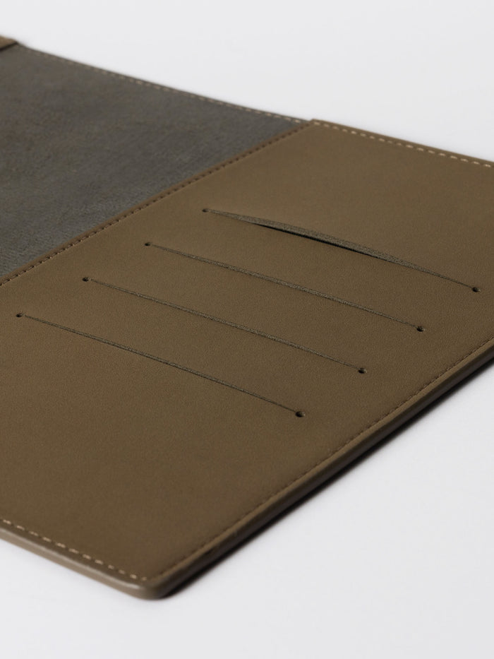 Closeup of folio. Four credit card slots are visible. Color shown is Cipher.
