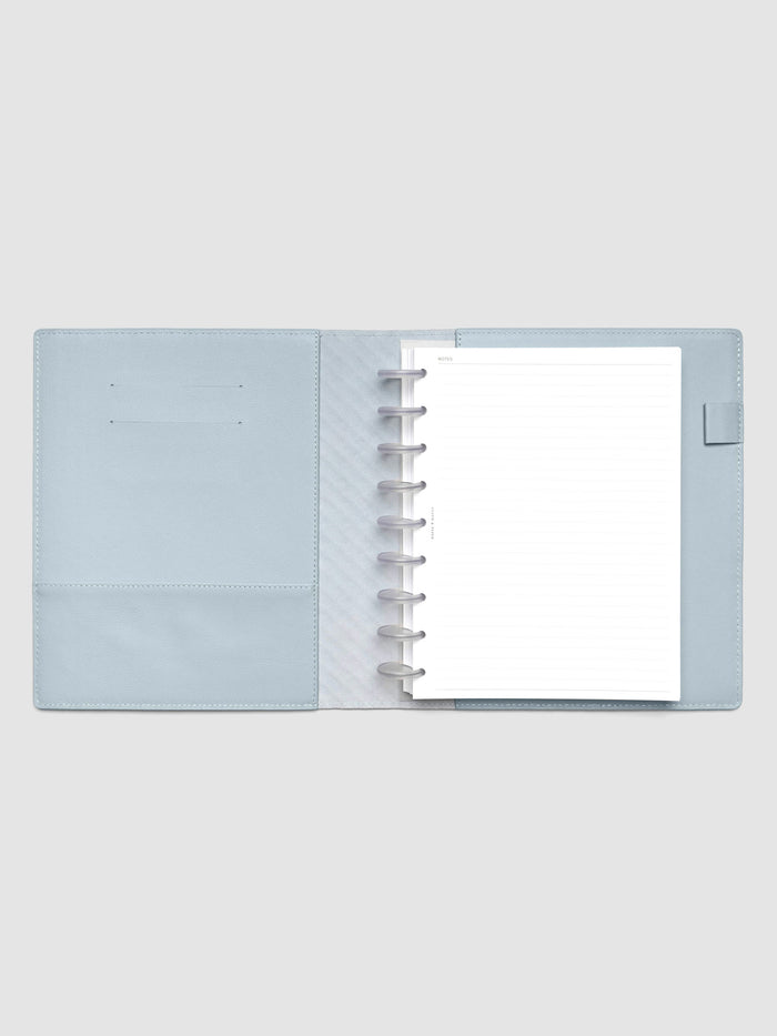 Blue leather planner folio with an HP Classic discbound planner inside.